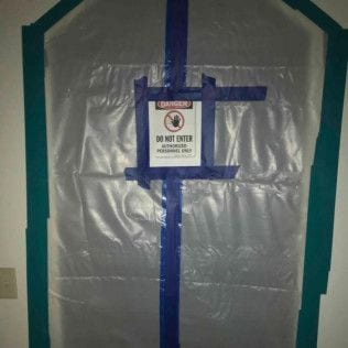 A door with a sign on it that says do not enter in Huntington Beach