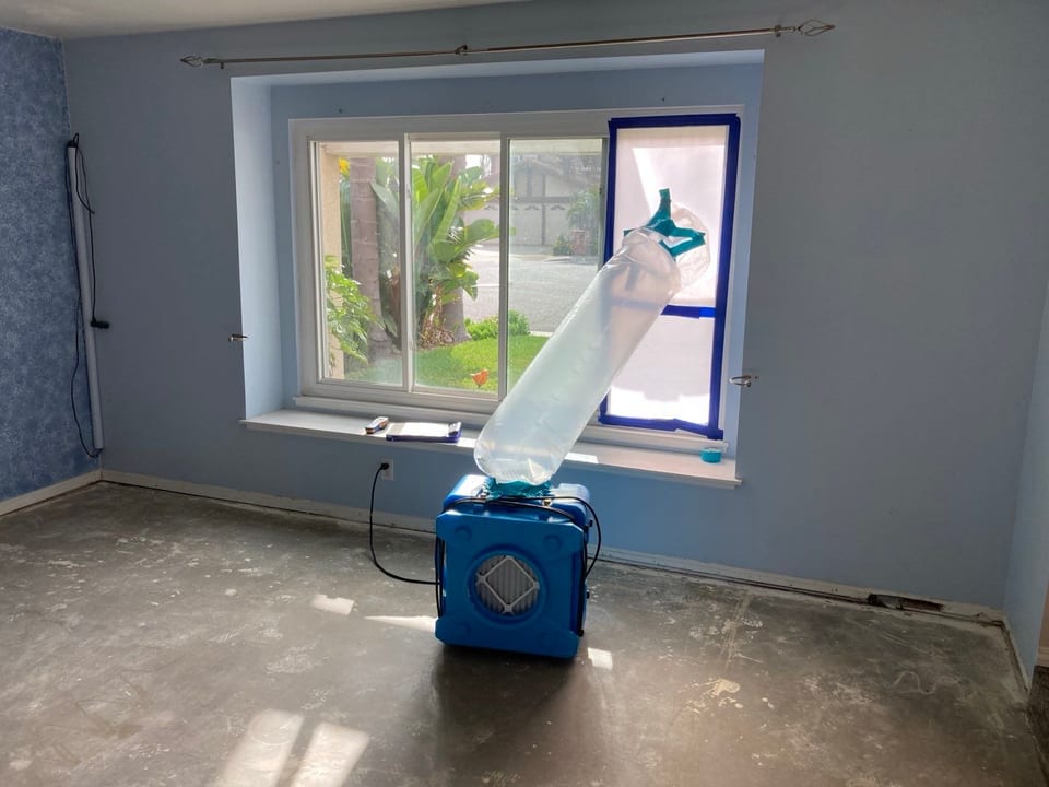 A room with a window and a machine in front of it in Fountain Valley, CA.